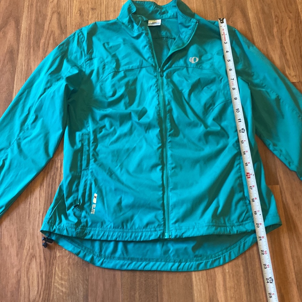 Pearl iZUMi cycling jacket. Teal/jade colored, ladies size S.